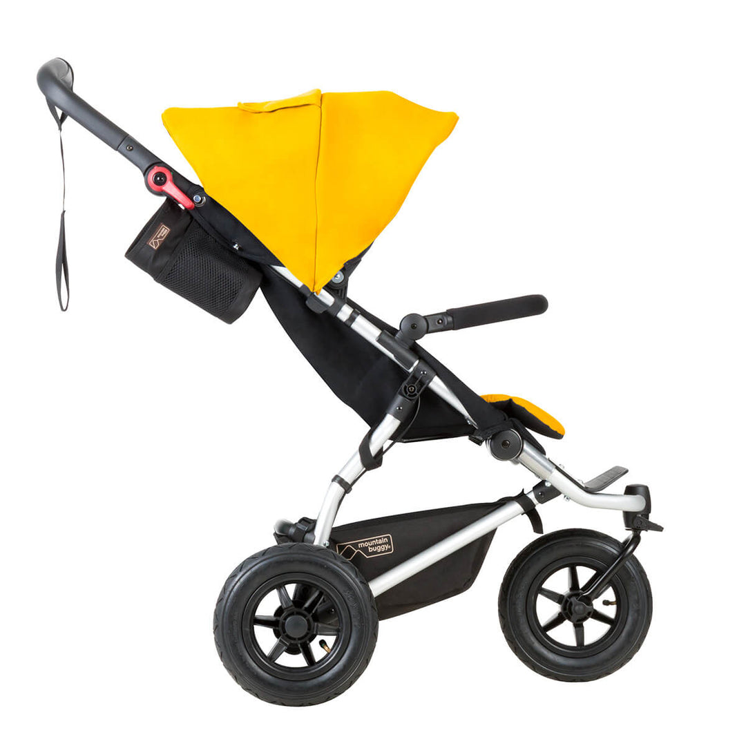 Mountain Buggy swift stroller side view_gold