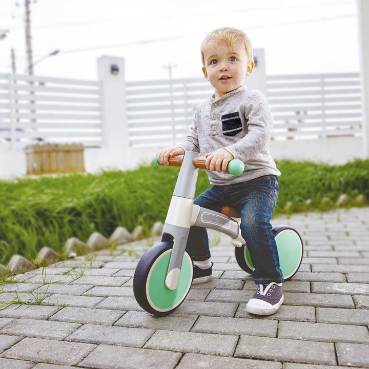 outdoor toys collection image of child riding balance bike