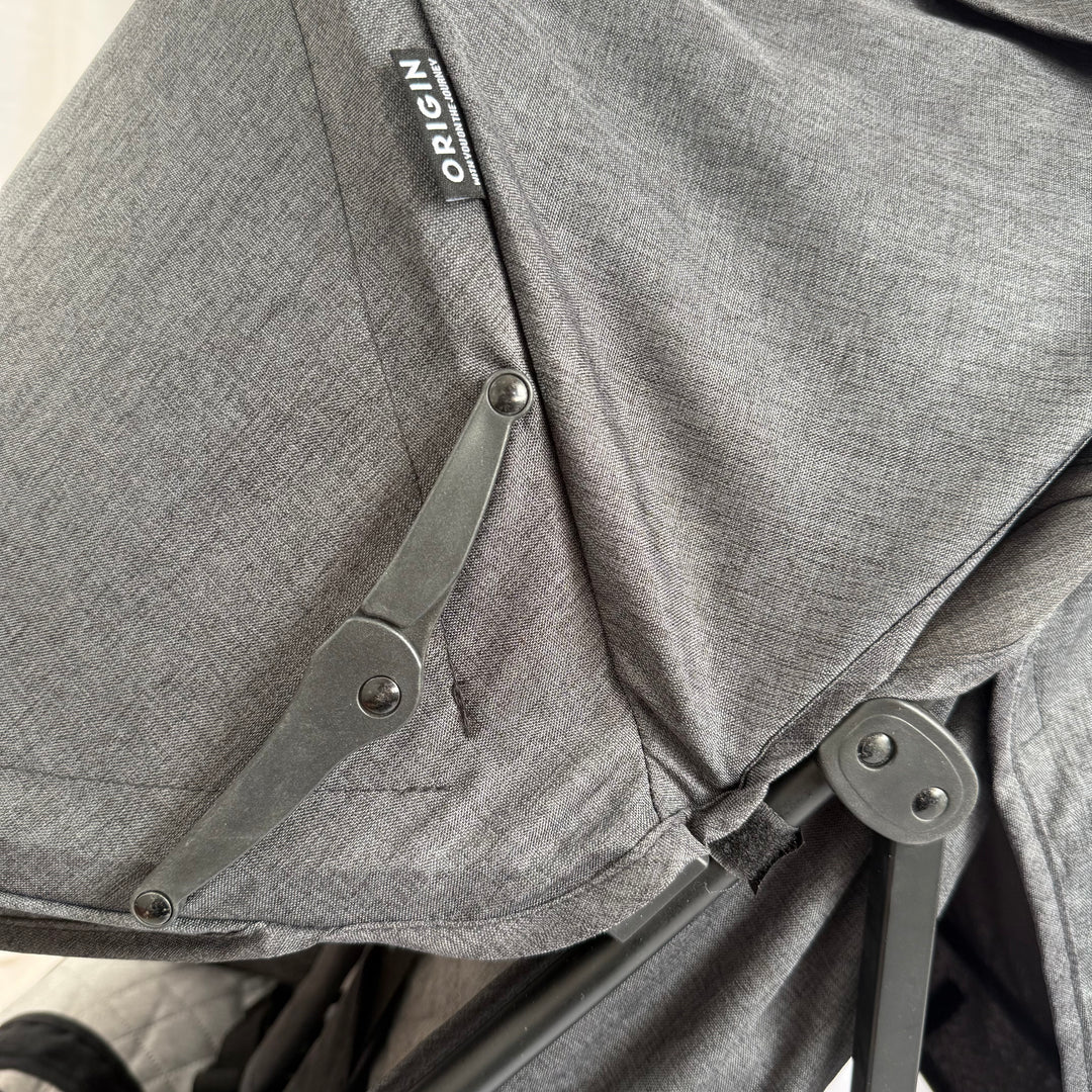 Close up of the ORIGIN Bellbird sunhood, showing the patterned fabric and mechanisms