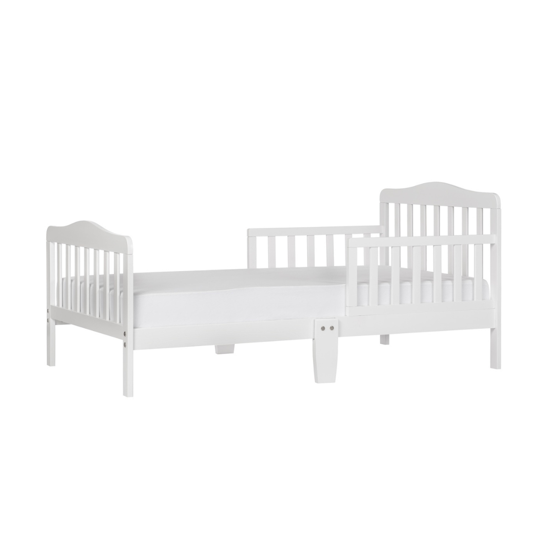 White crib with slatted headboard on a white background