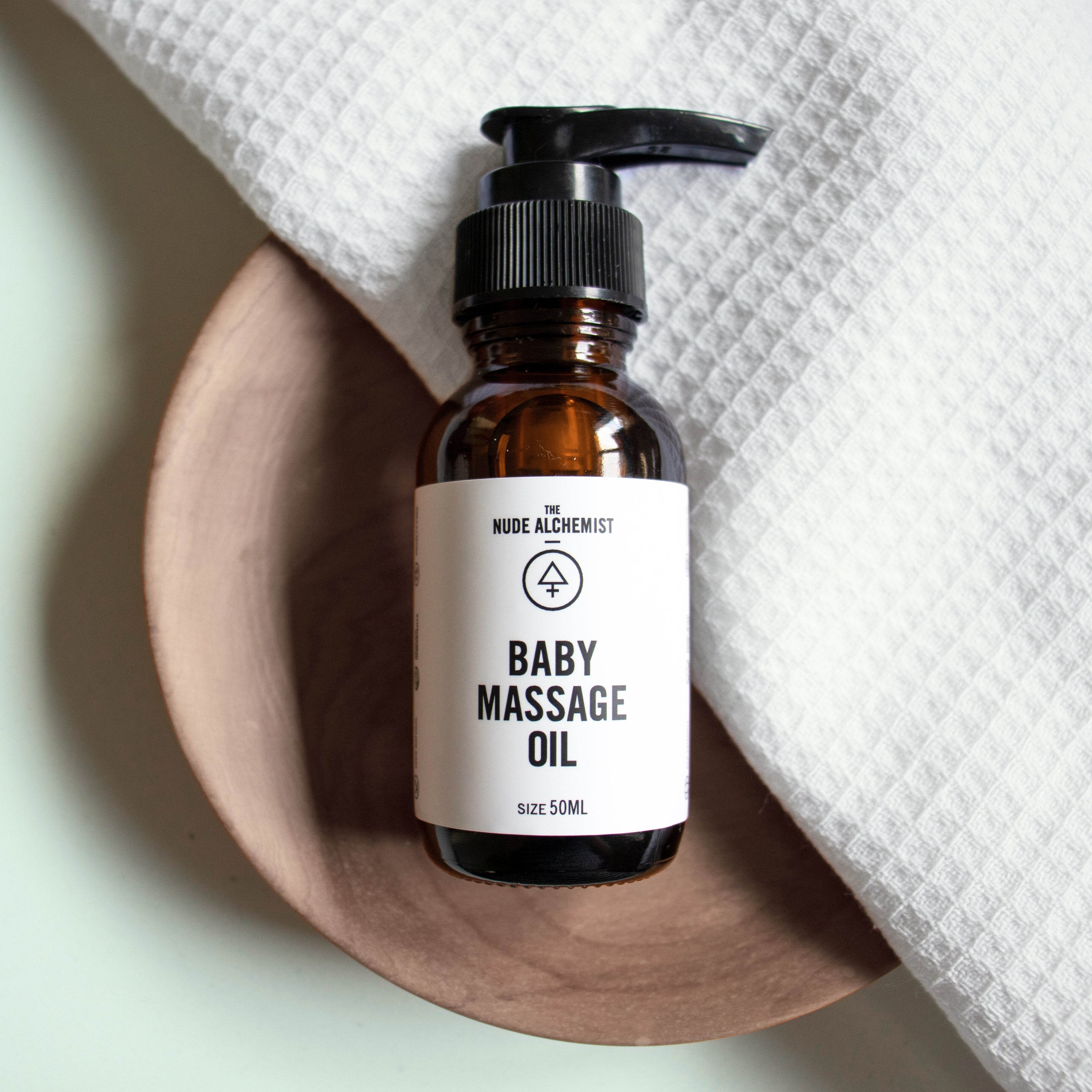 The Nude Alchemist Baby Massage Oil 50ml – gentle nourishing massage oil for baby’s skin.
