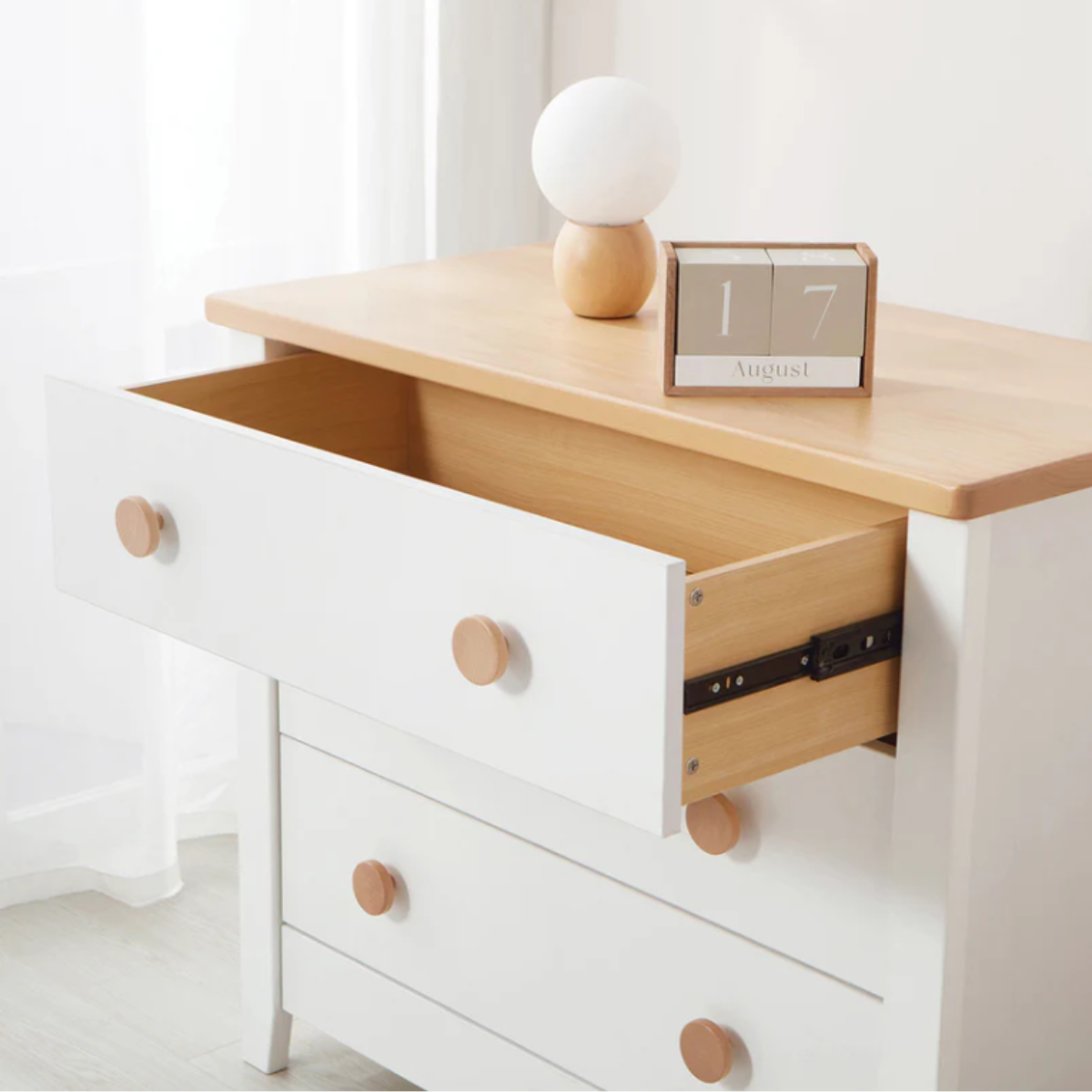 White Boori 3 draw dresser with wooden accents ajar