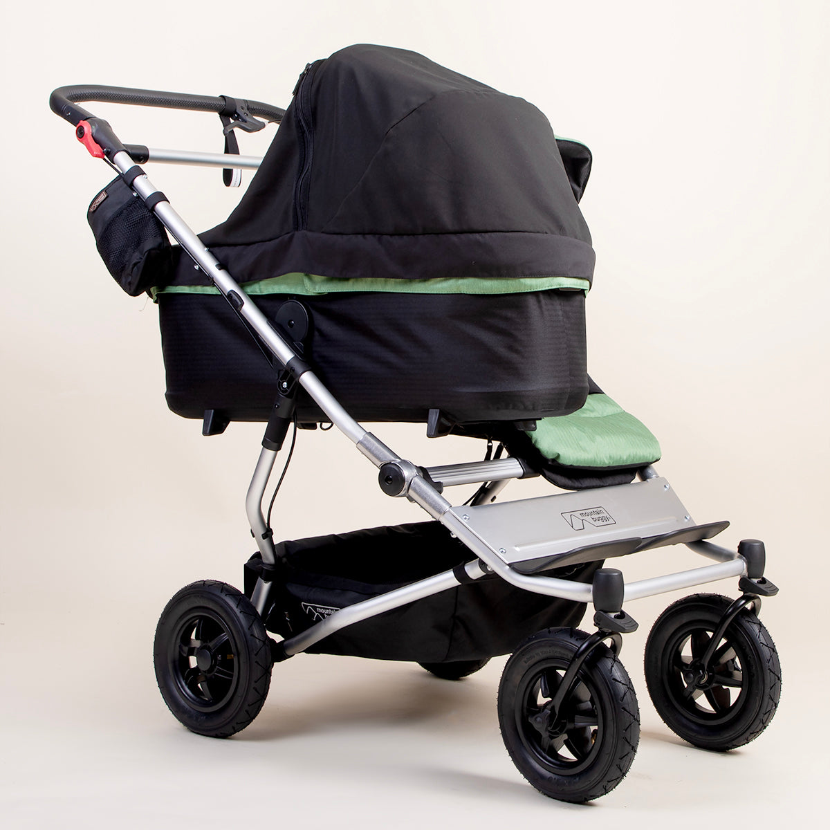 full shot of a mountain buggy duet carrycot plus blackout cover on a matcha carrycot plus next to a duet seat 