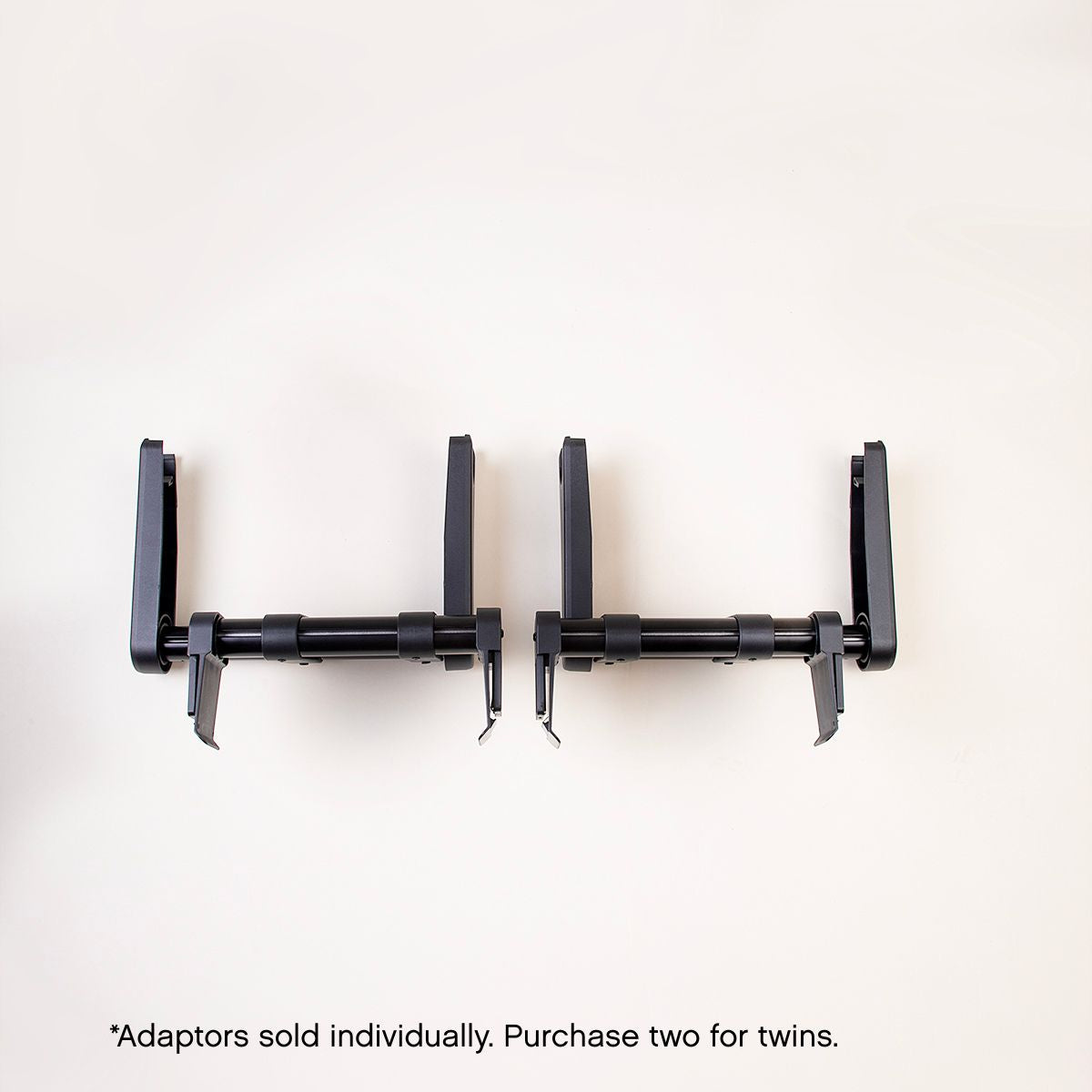 top down view of mountain buggy car seat adaptors shown side by side