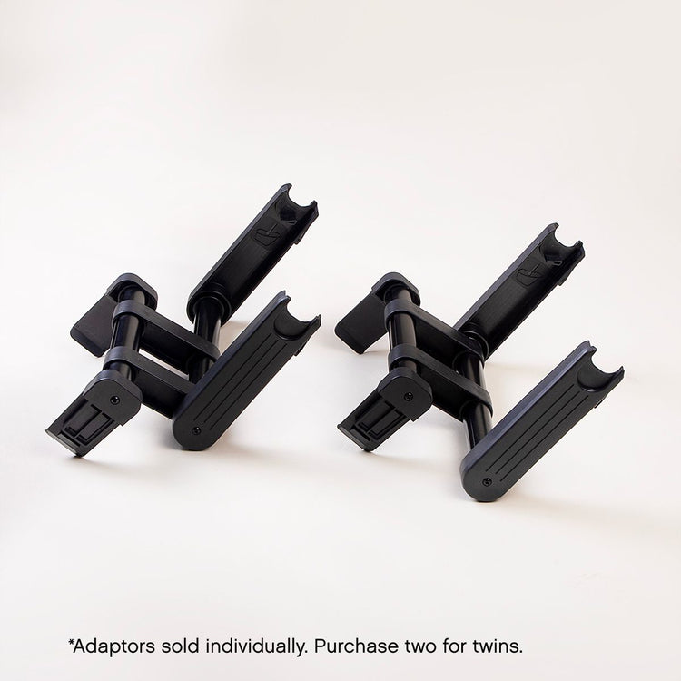 side view of mountain buggy car seat adaptors shown side by side