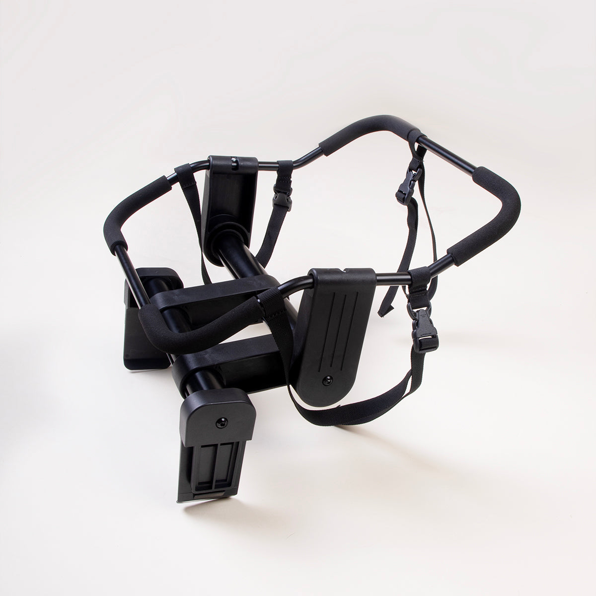 side view of mountain buggy duet universal car seat adaptor on a white background