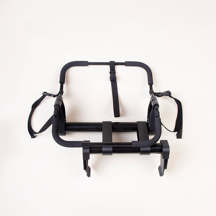 top down view of mountain buggy duet universal car seat adaptor with a right offset on a white background