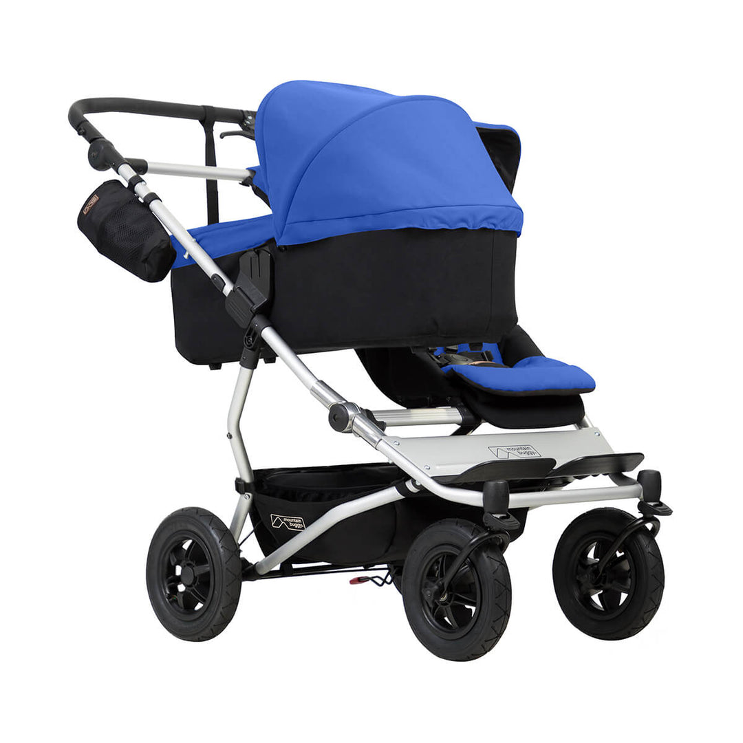 mountain buggy duet with one carrycot plus in lie flat mode three quarter view shown in color marine_marine