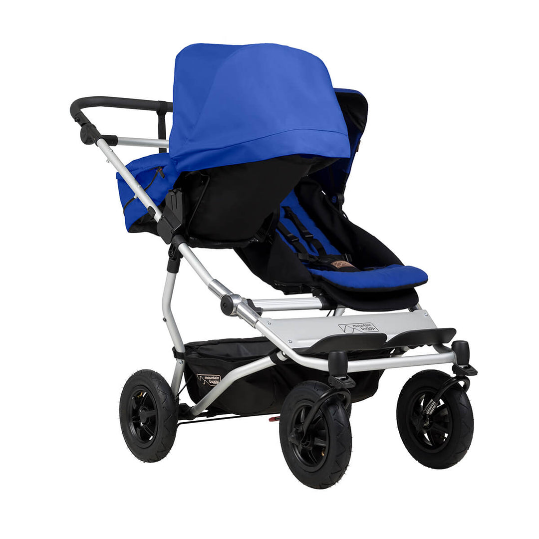 mountain buggy duet double buggy with one carrycot plus in parent facing mode three quarter view shown in color marine_marine