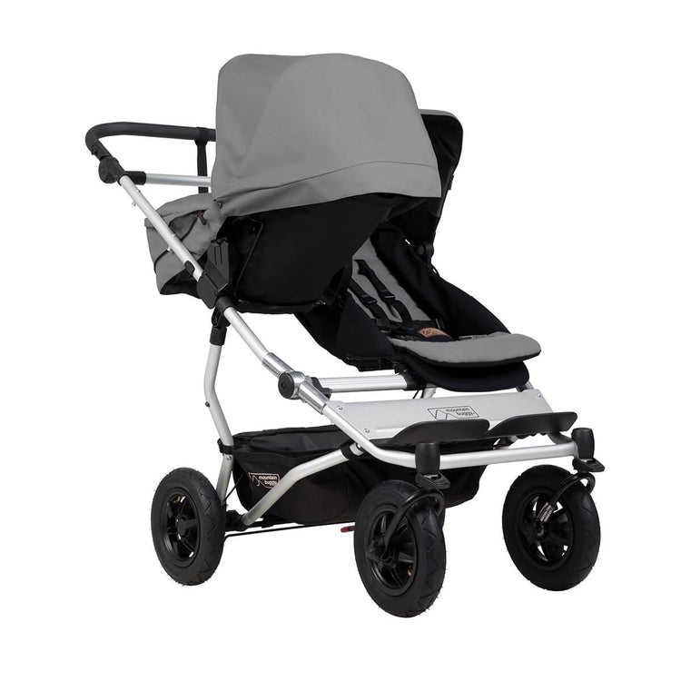 mountain buggy duet double buggy with one carrycot plus in parent facing mode three quarter view shown in color silver_silver