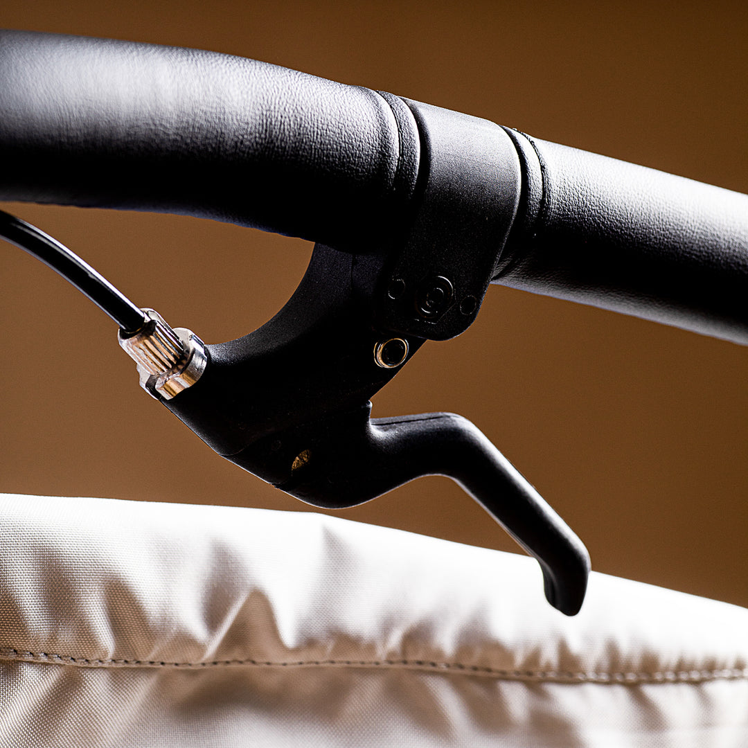 close up shot of the Mountain Buggy terrain handle showing the lever brake