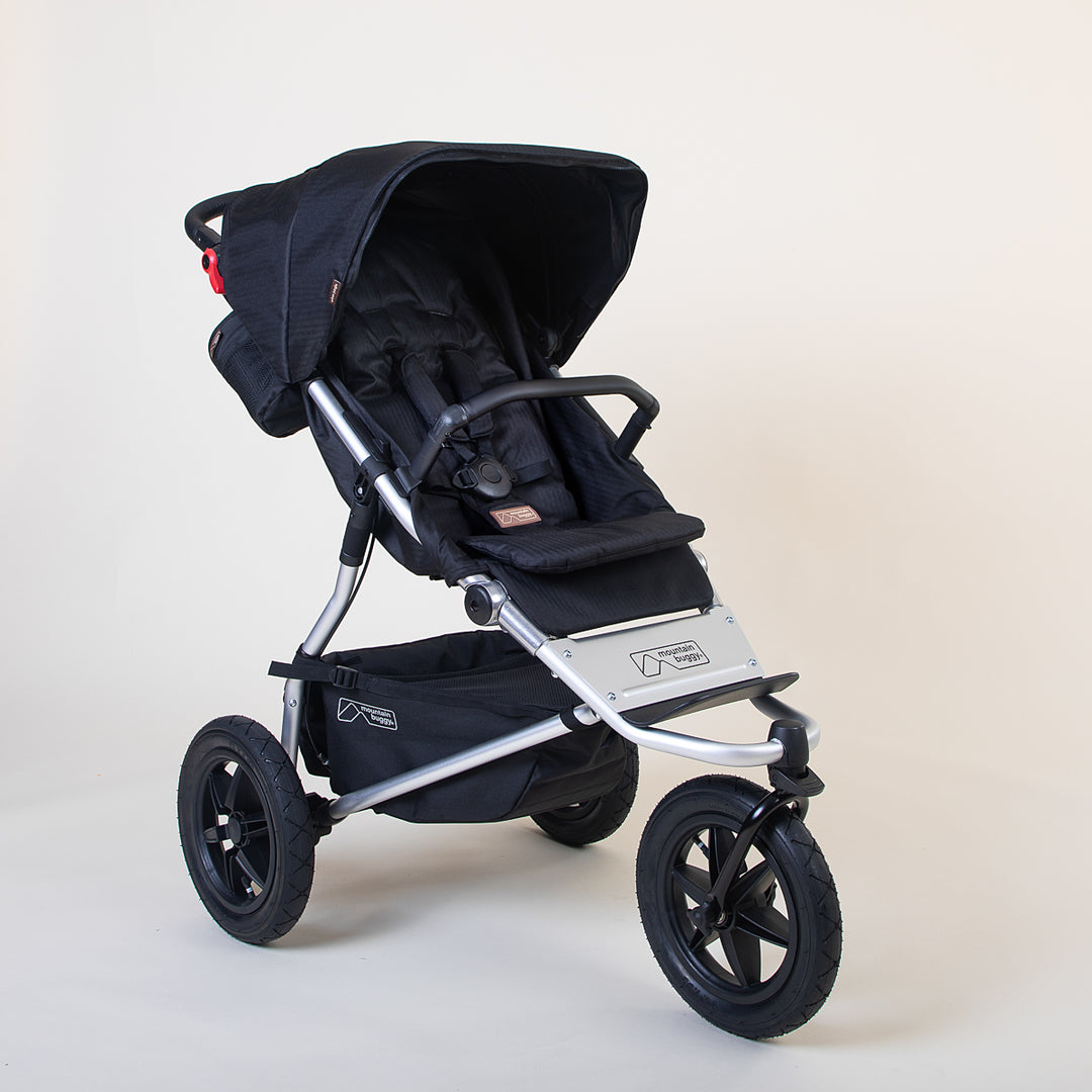 Full shot of the Mountain Buggy urban jungle in caviar black shown on a white background