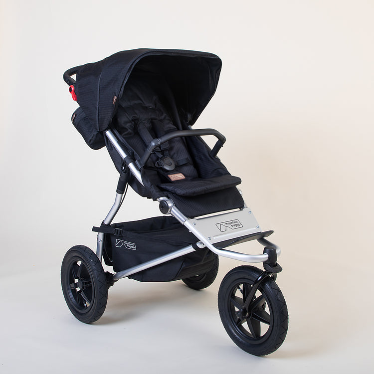 Full shot of the Mountain Buggy urban jungle in caviar black shown on a white background