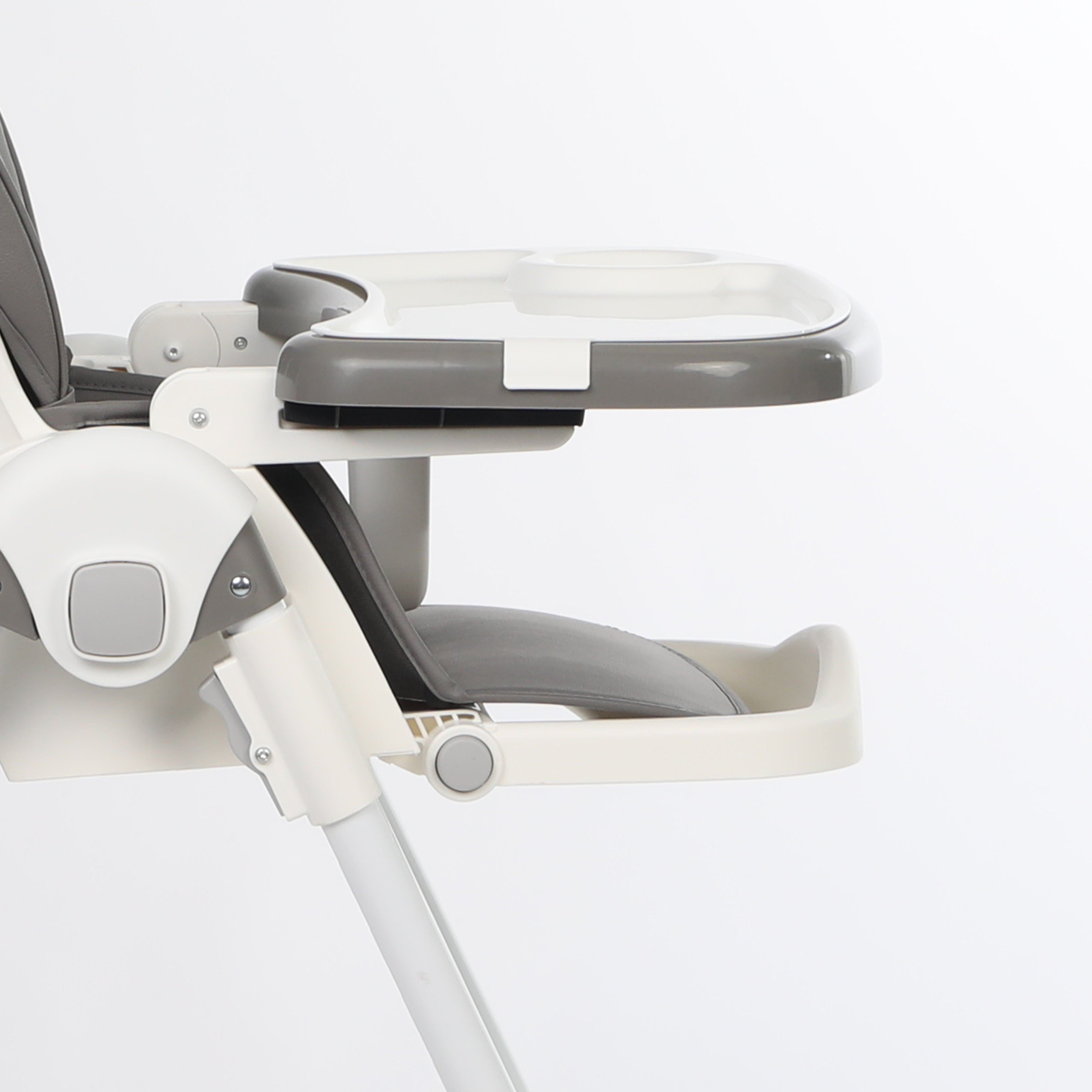 ORIGIN Marigold highchair closeup view showing legs and footrest on white background