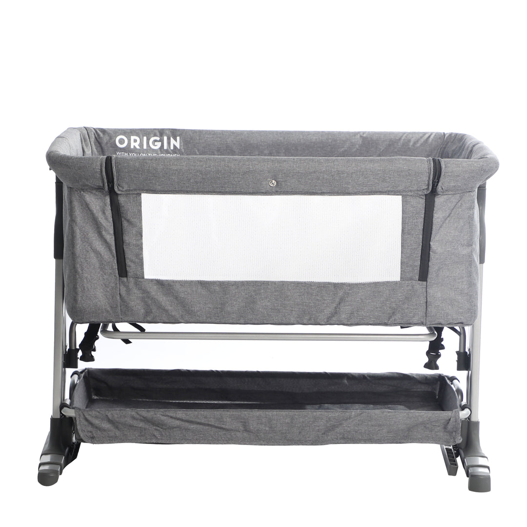 ORIGIN Morepork co-sleeper bedside bassinet in neutral colour, side view at low height