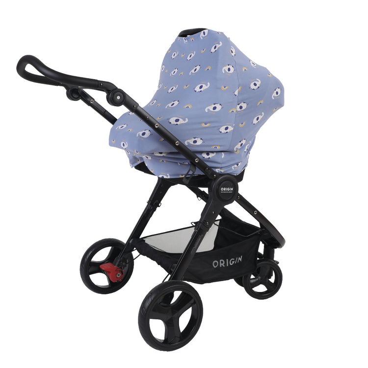 ORIGIN 5 in 1 Cover being used to cover a buggy showcasing the blue elephant design option