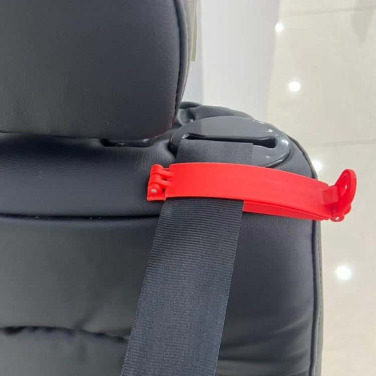 ORIGIN Belt Clamp attached to vehicle seat belt to keep sash from retracting during child seat installation.