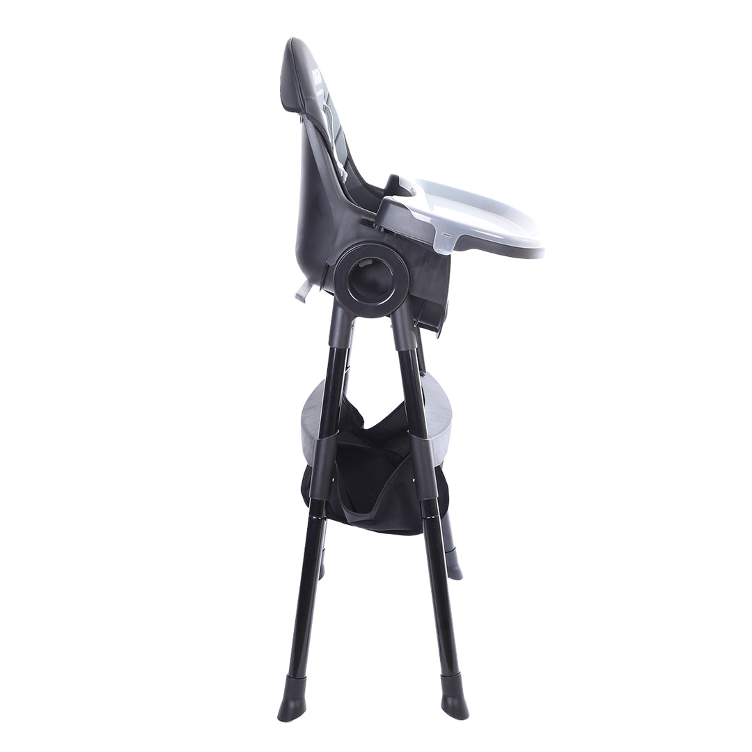 ORIGIN Manuka Highchair folded upright for compact storage and easy transport.