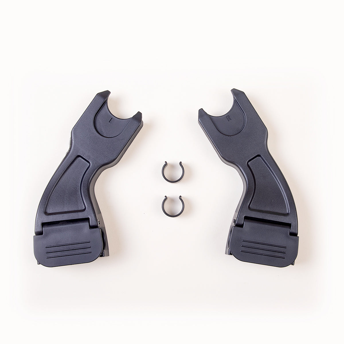 Car seat adaptor for Mountain Buggy swift shown top down on a white background