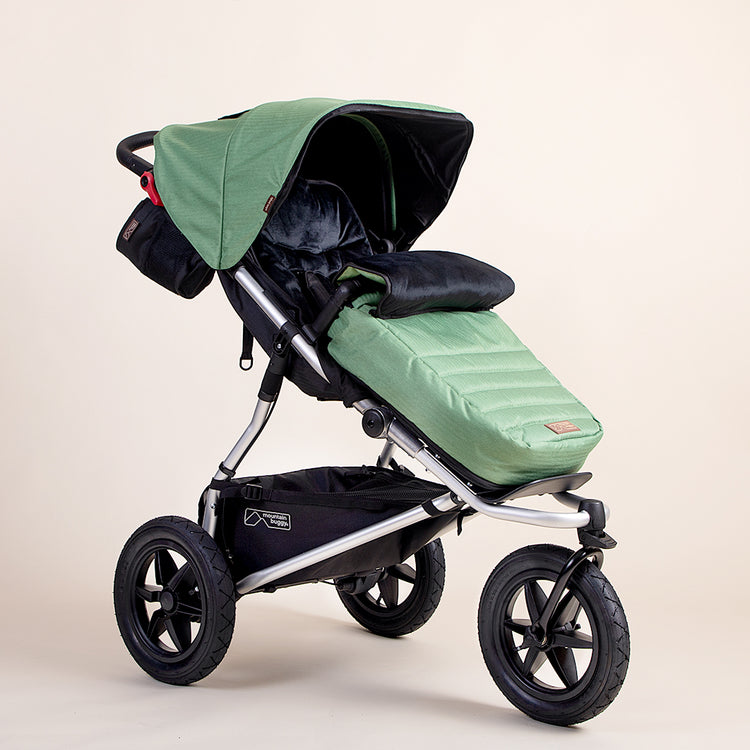 Full shot of Mountain Buggy urban jungle footmuff in colour matcha