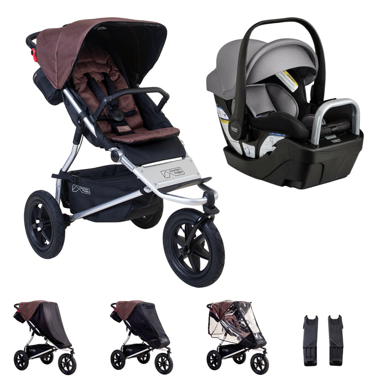 Hero image of the mountain buggy urban jungle and britax willow s bundle shown with the covers and car sear adaptors that are included