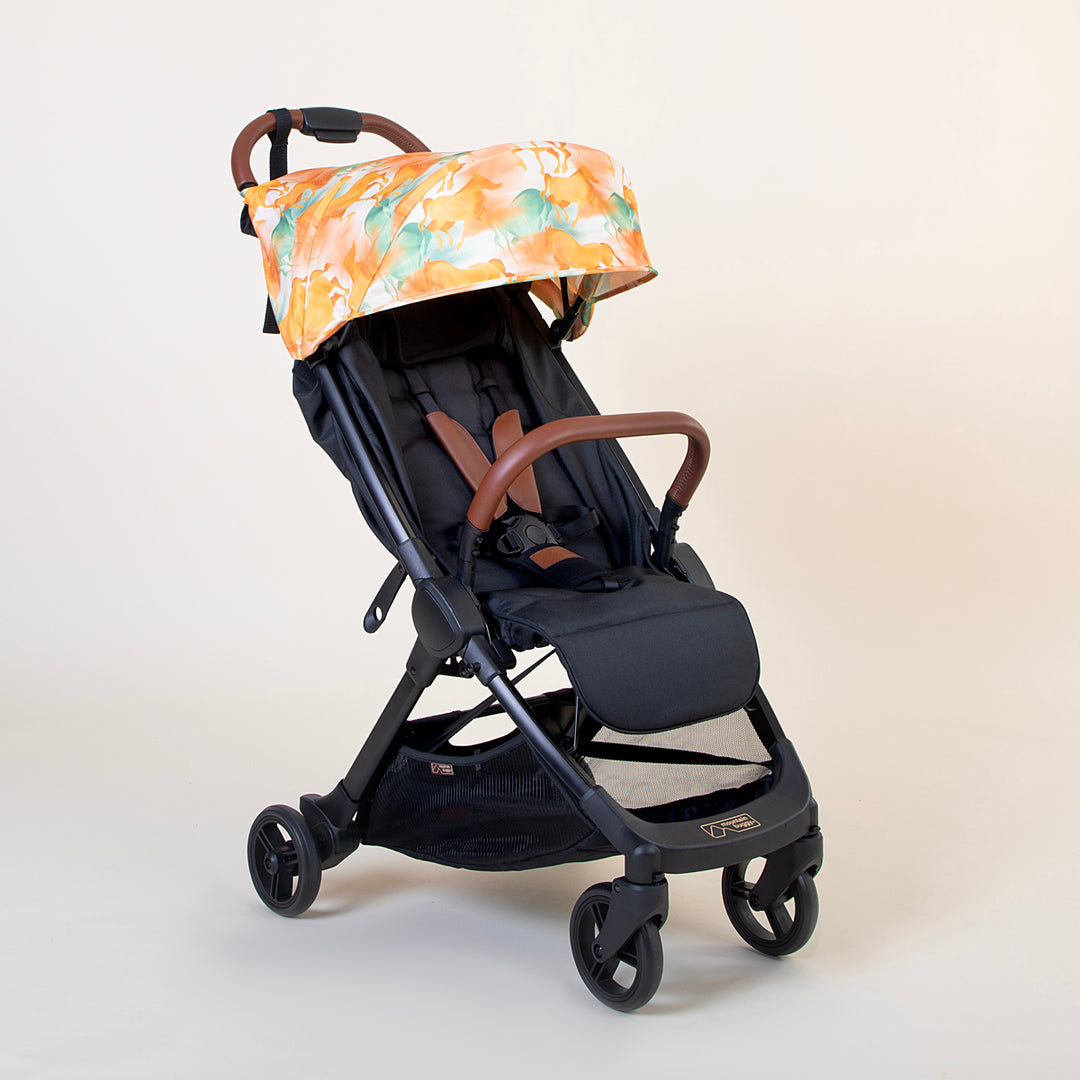 Full angled shot of the Mountain Buggy nano urban in Year of the Horse option shown against a white background