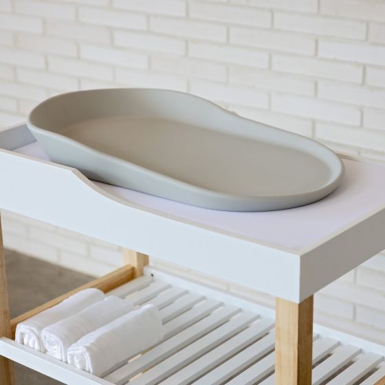 angled shot of babyfirst foam changing mat on top of changing table