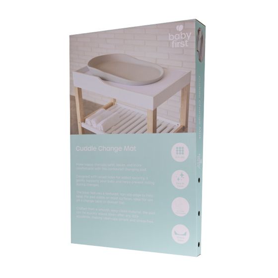 Front of box packaging of 'Cuddle Change Mat' with illustrations on a light blue background.