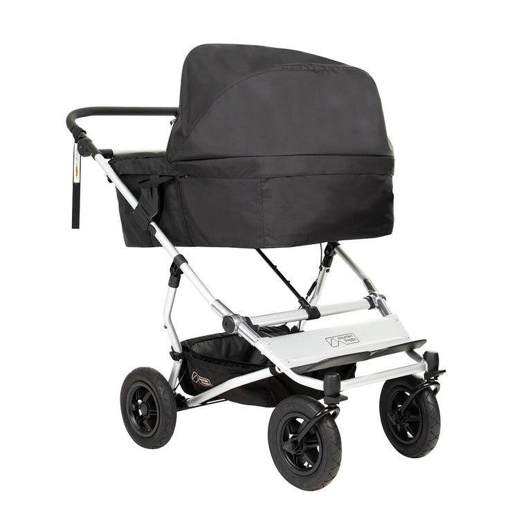Mountain Buggy carrycot plus for twins three quarter front view