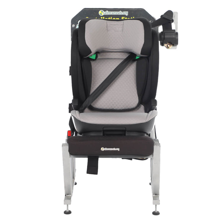 Mountain Buggy haven i-size booster car seat fitted in car seat front view