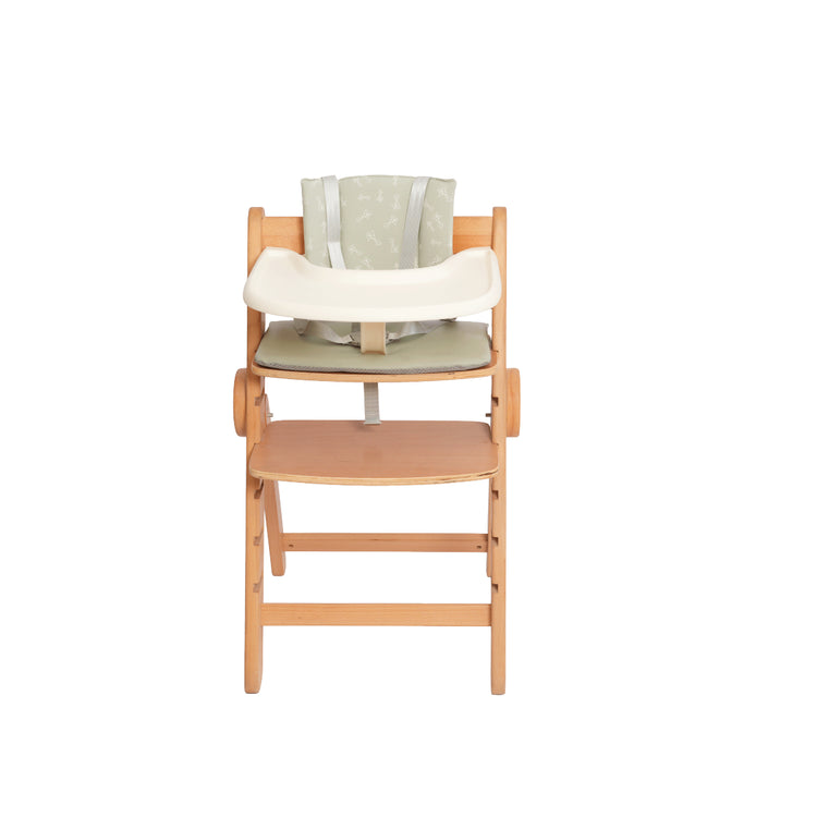 ORIGIN Camoline Wooden Highchair with baby setup and tray in natural wood finish.