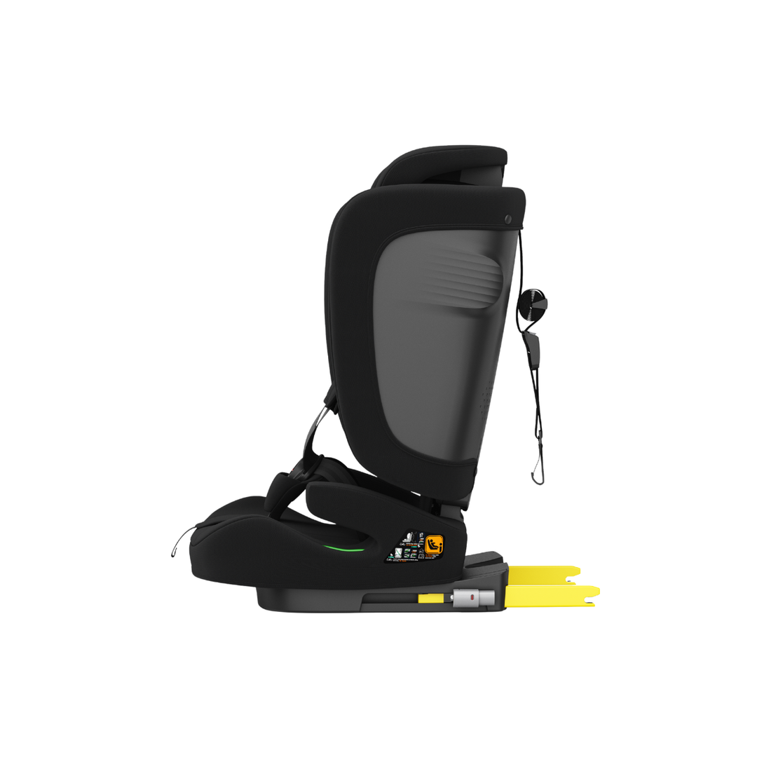 Side view of Origin Kauri V2 booster seat showing installation instruction labels and harness strap panel