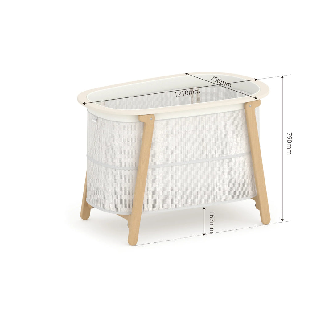 White crib with wooden legs and measurements on a white background