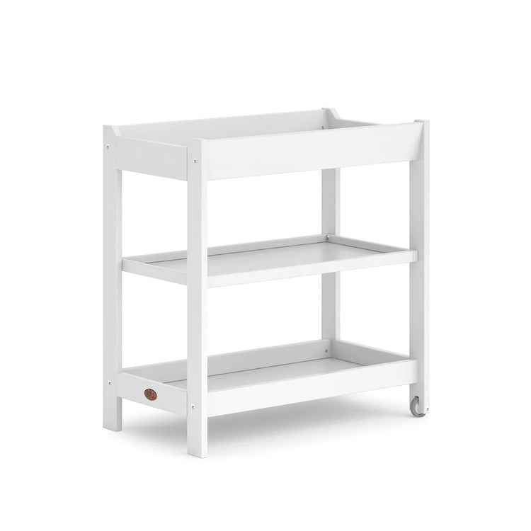 White baby changing table with a visible brand logo on a white background