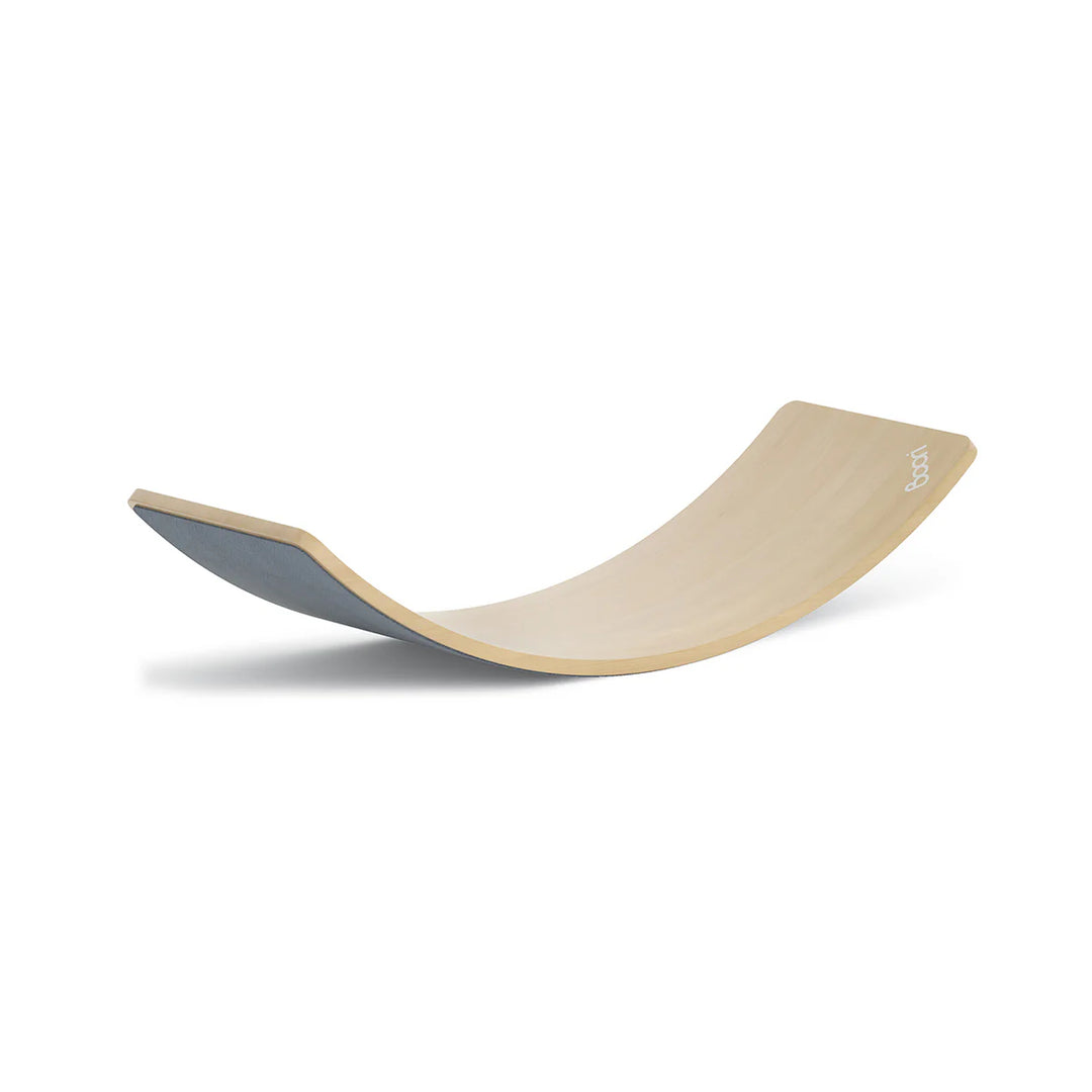 Wooden wobble board on a white background