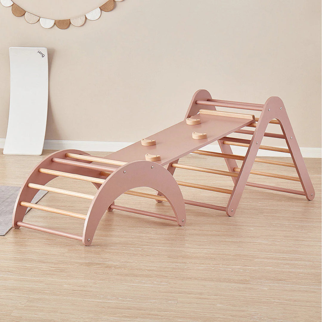 Wooden climbing toy with steps on a wooden floor