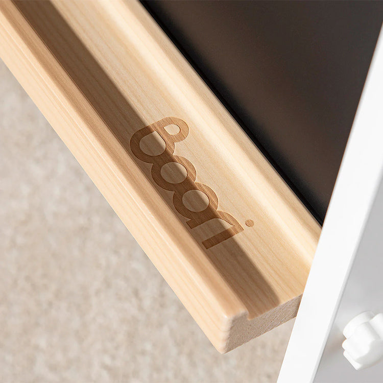 Wooden stick with 'Pop!' branding on a neutral background