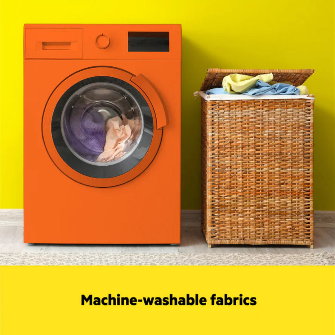 Orange washing machine and wicker laundry basket against a yellow wall with text 'Machine-washable fabrics'.