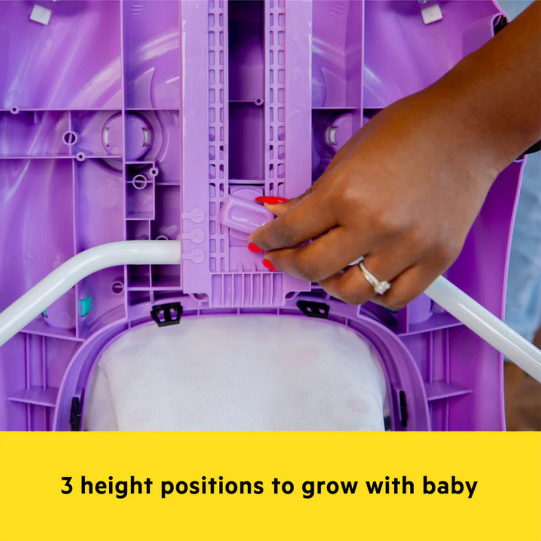 Purple baby high chair with hand adjusting it, text '3 height positions to grow with baby' at the bottom.