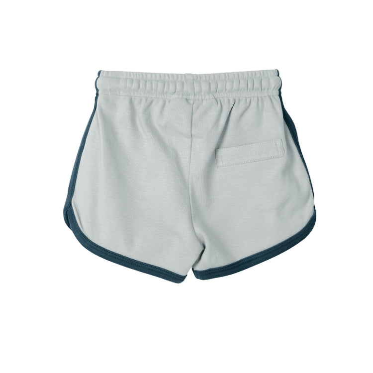 Light gray shorts with navy trim on a white background