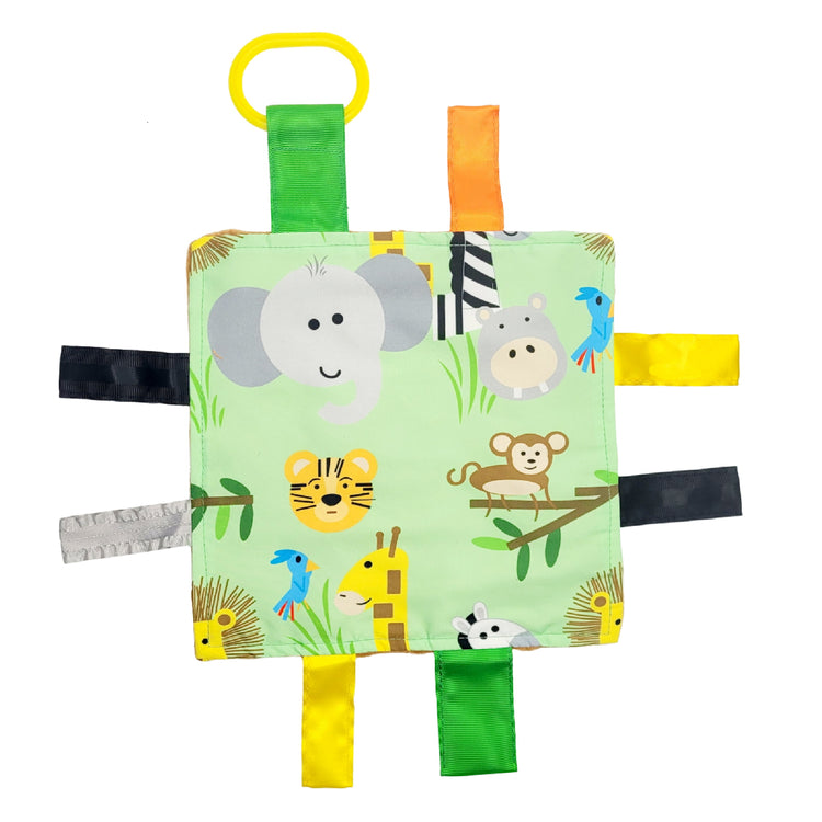 Baby toy with animal designs on a green background