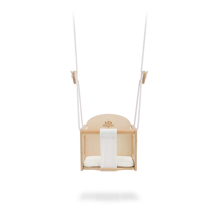 Baby swing with a white cushion on a white background