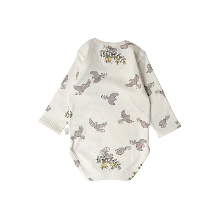Baby onesie with bird pattern on a white background