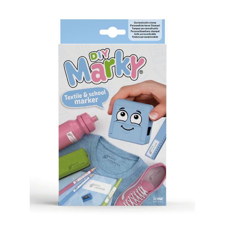Packaging of DIY Marky textile and school marker with a cartoon character on a white background