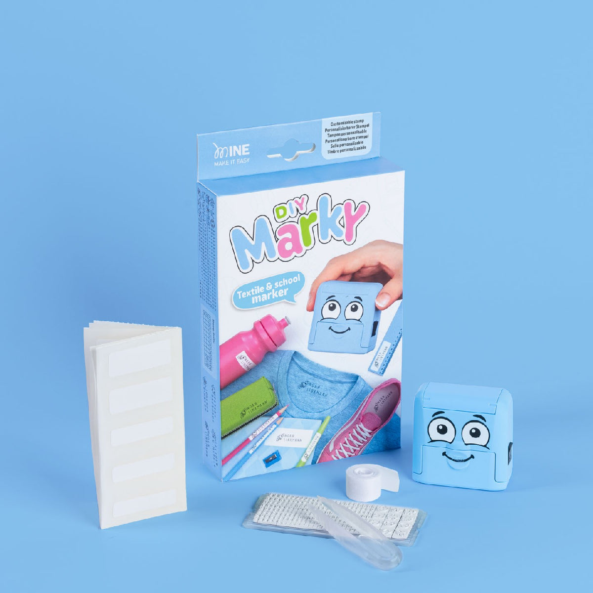 Children's first aid kit with packaging on a blue background