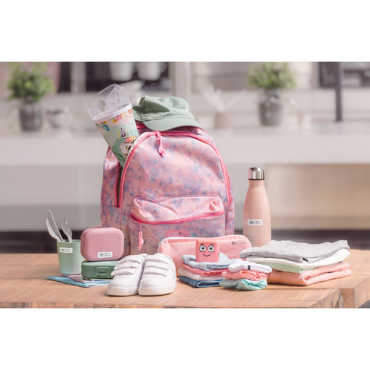 Backpack with school supplies including a water bottle, books, and shoes on a wooden table.