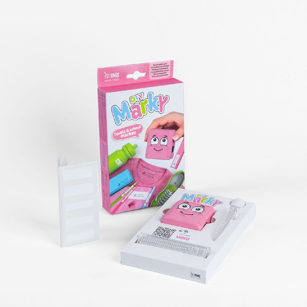 Pink toy packaging with cartoon character on a white background