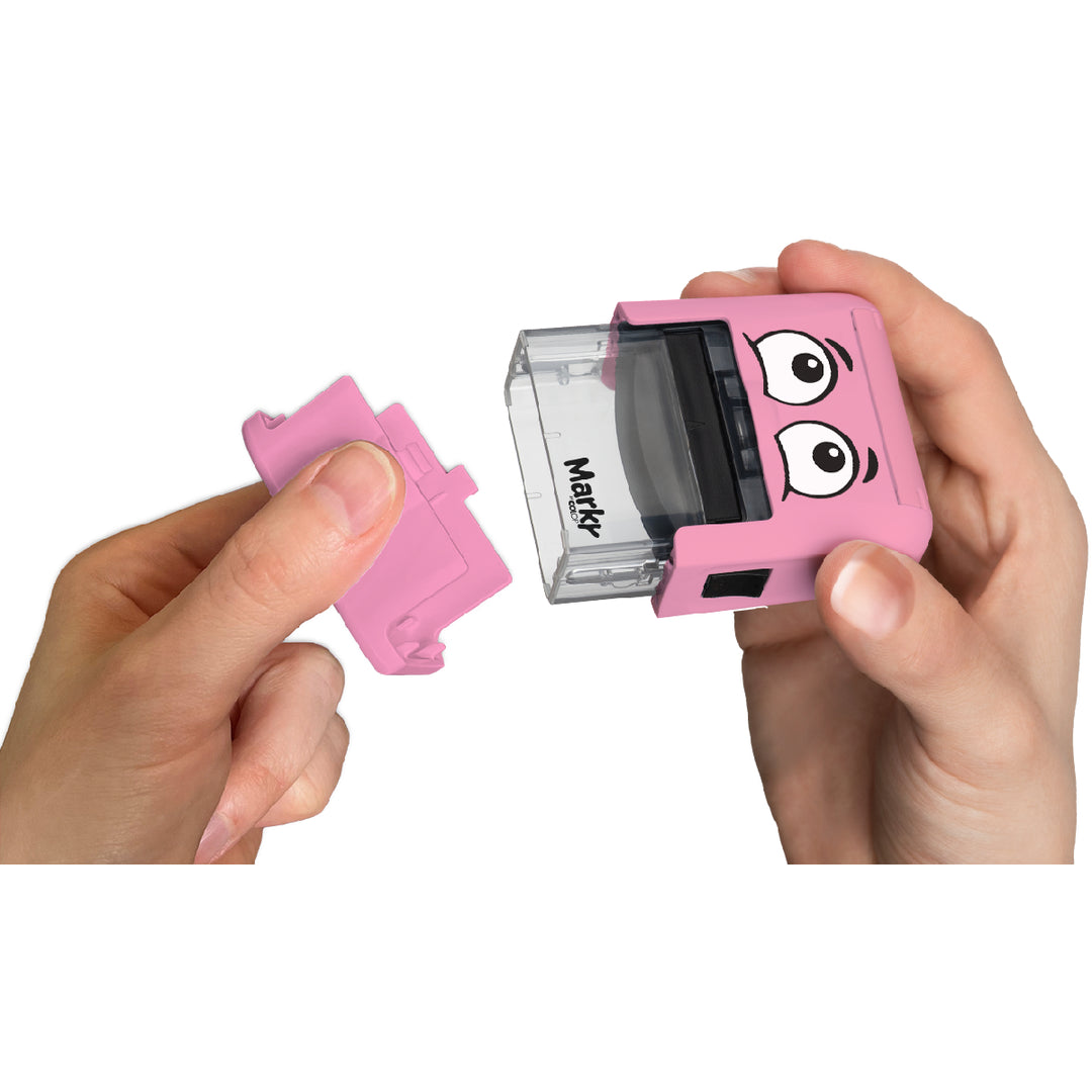 Pink cartoon-style sharpener with a hand holding it on a white background