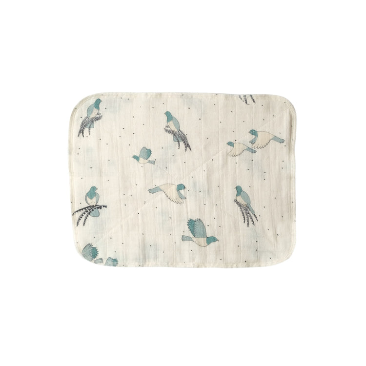 Baby blanket with bird pattern on a white background