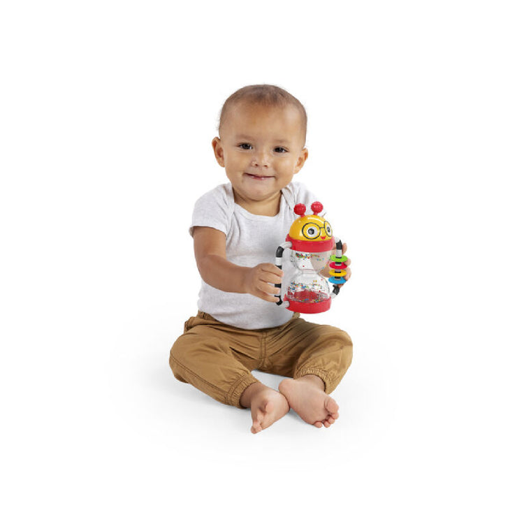 Child holding a colorful toy with a white background
